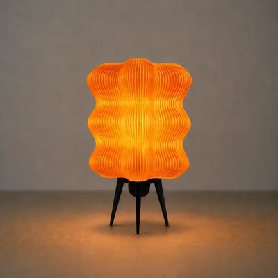 Lámpara de mesa Aura Wave Negro/Naranja SLVJE, ideal como velador o lámpara de escritorio